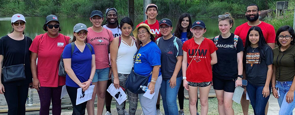 UIW students and staff stand in front of the Rio Grande on the U.S. Mexico border in the Rio Grande Valley