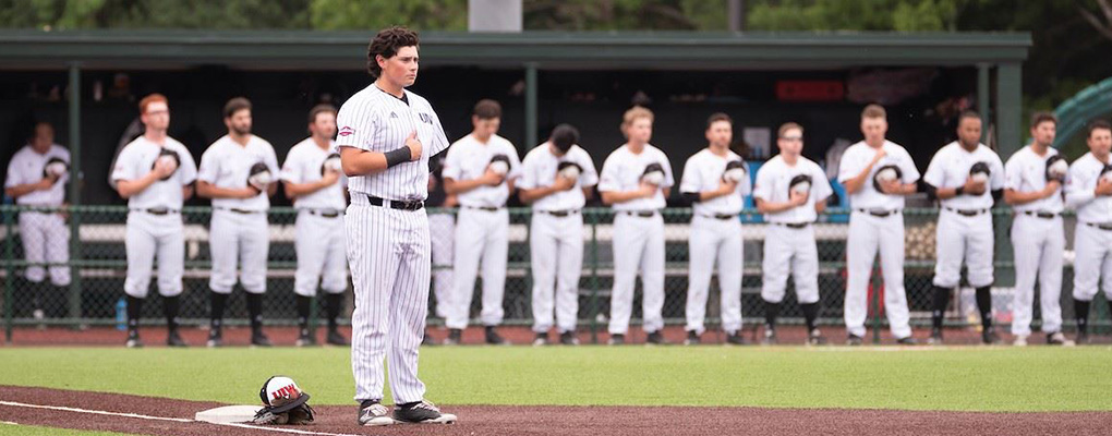 UIW baseball team stands at attention for national anthem