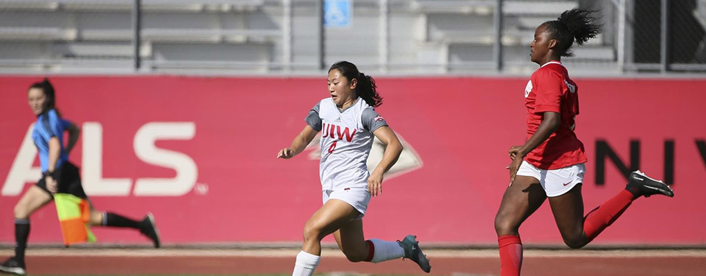 UIW soccer player runs down field