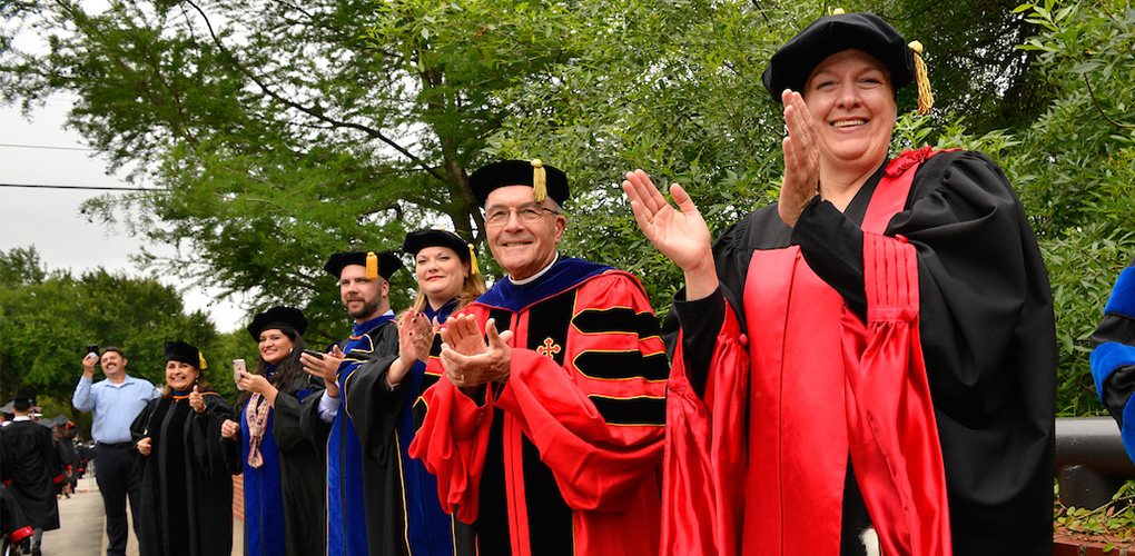 UIW faculty congratulate students as the process to the Baccalaureate Mass