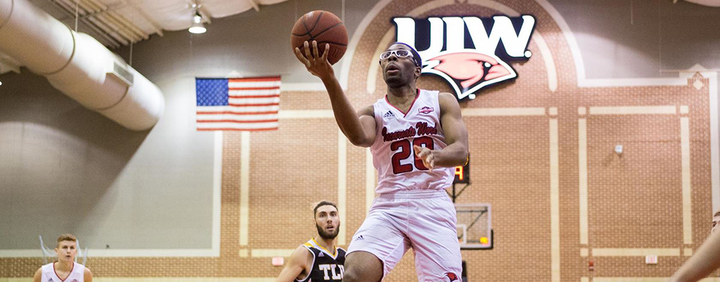UIW basketball player attempts to score