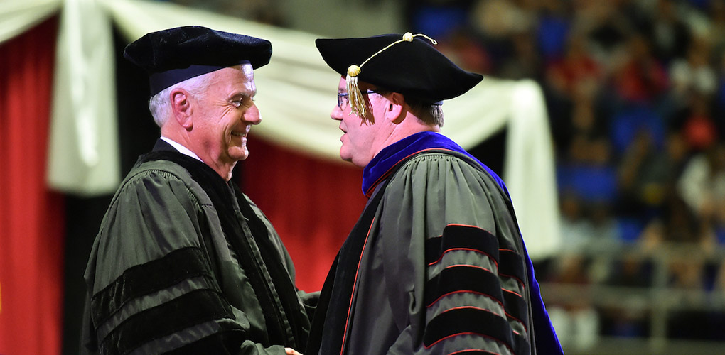 UIW President, Dr. Thomas Evans, and UIW Chairman of the Board, Charles Lutz, celebrate the class of 2019