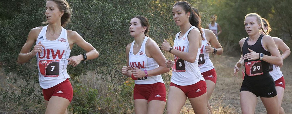 UIW cross country team members run