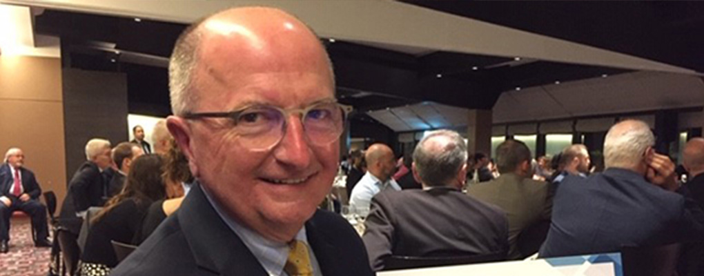 Dr. Timothy Wingert smiles at the camera after being awarded his fellowship 