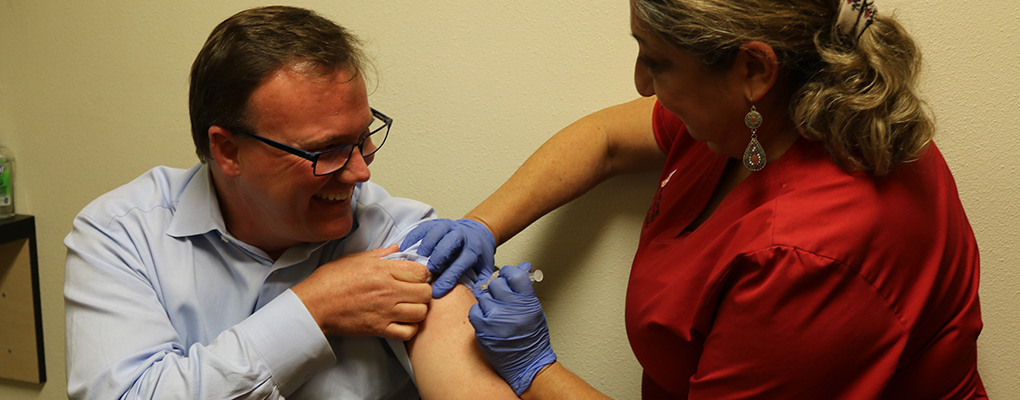 Dr. Evans gets a flu shot