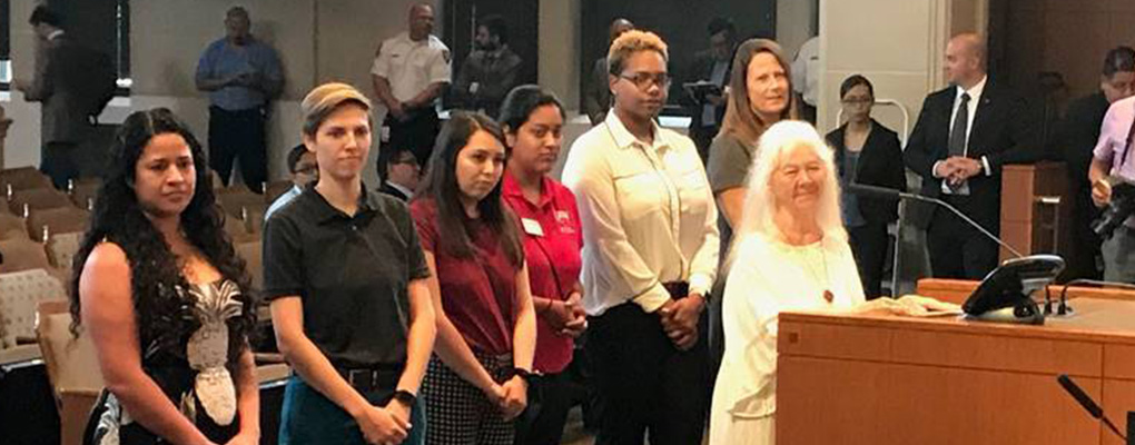 Members of the UIW community stand before San Antonio's city council