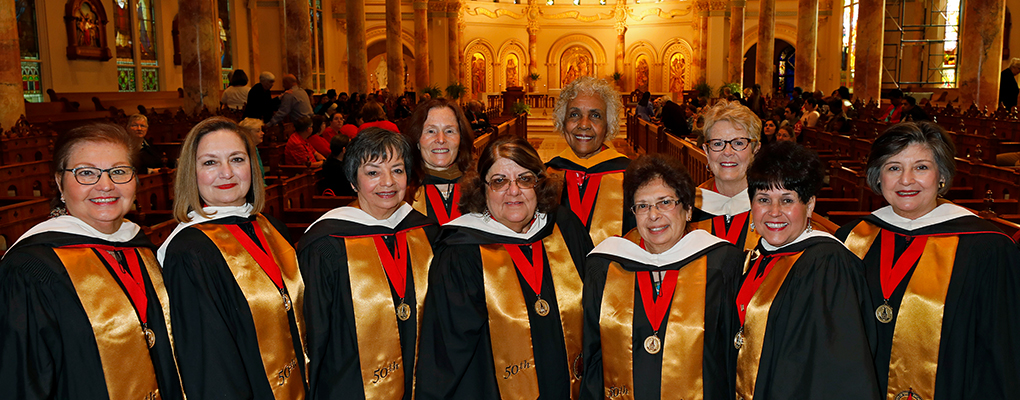 Members of the Incarnate Word College Class of 1969 pose for a photo in Our Lady's Chapel 