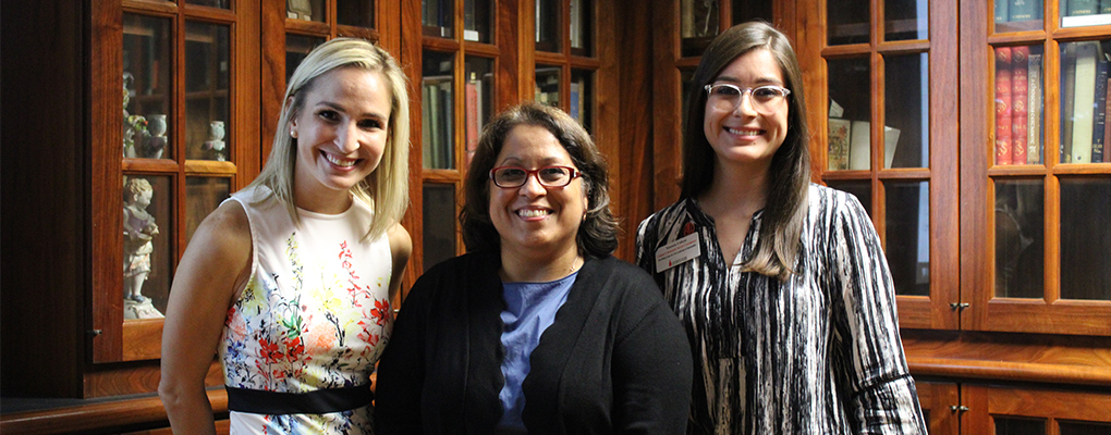 Yesenia Caloca, Dr. Cynthia Orozco and Dr. Laura Cannon smile at the camera for a photo together