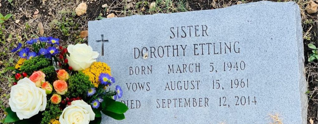 Flowers are laid at Sr. Dot's grave