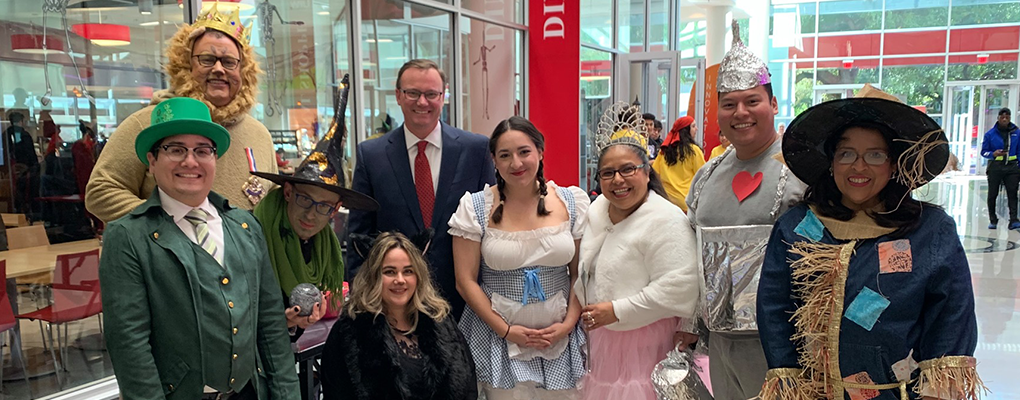 UIW community members dressed as characters from the wizard of oz pose for a photo