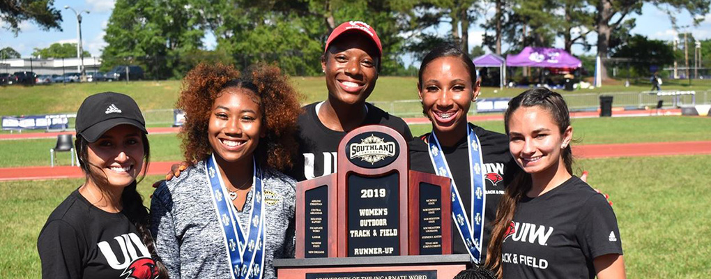 UIW women's track wins runner-up and holds trophy