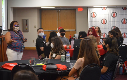 Large group of students participating in lecture