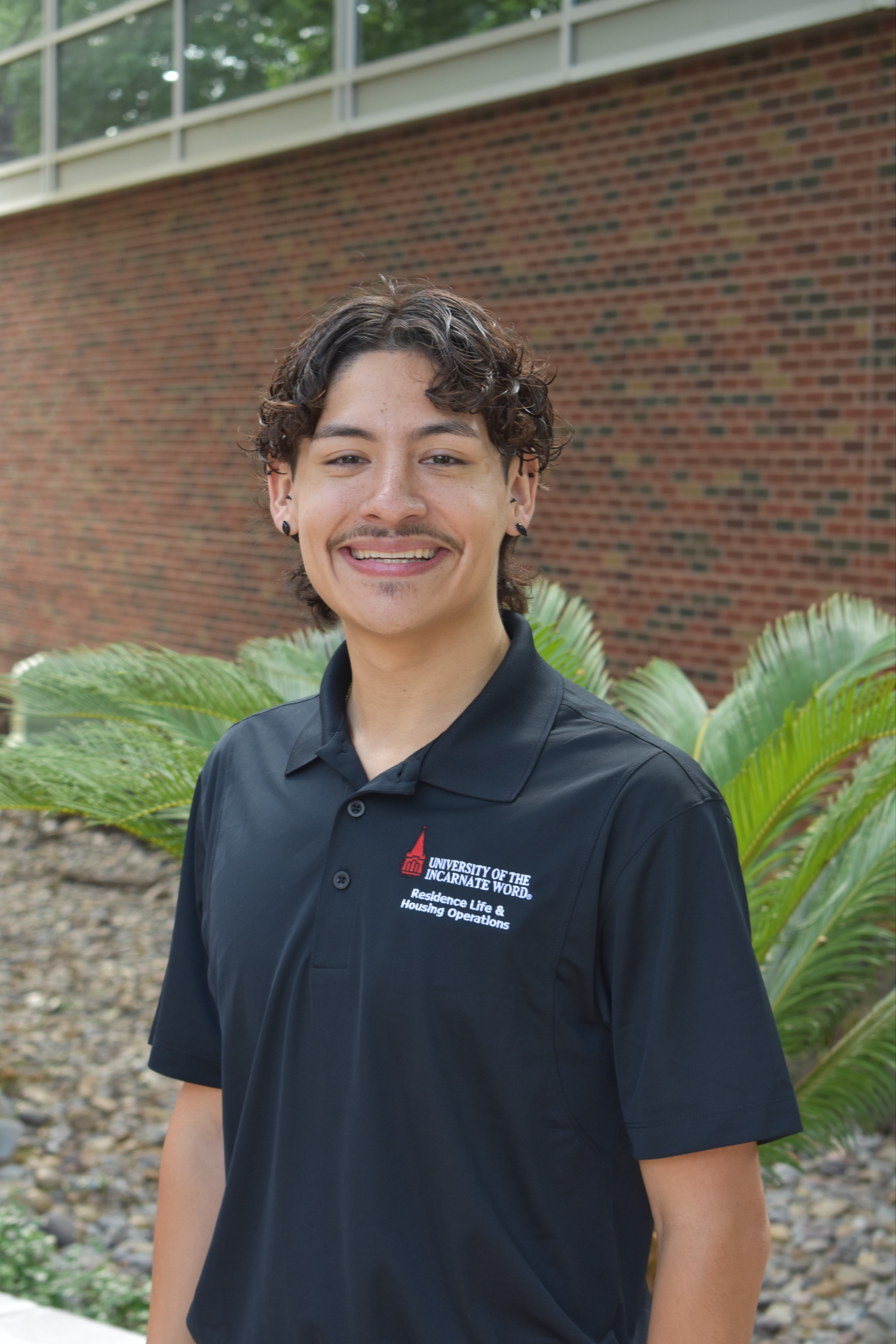 picture of male housing staff member