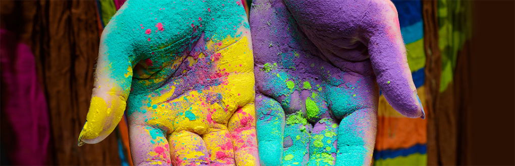 hands full of colorful powder
