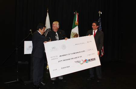president agnese receives check from mx consulate