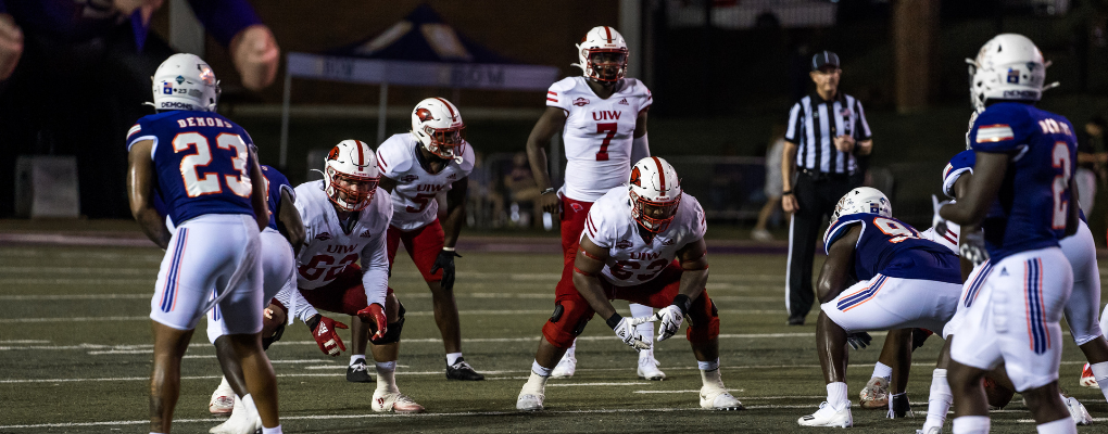 UIW football student-athletes play a game against Northwestern