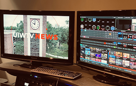 Computer monitors display broadcast news software