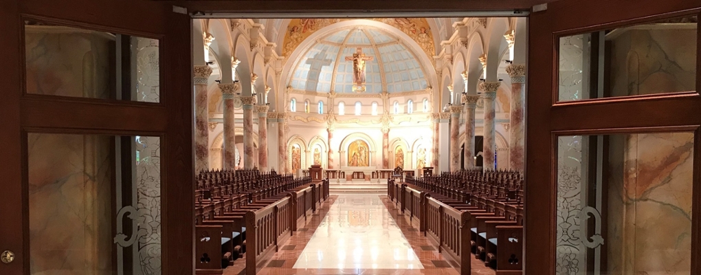 The view of a chapel through open doors