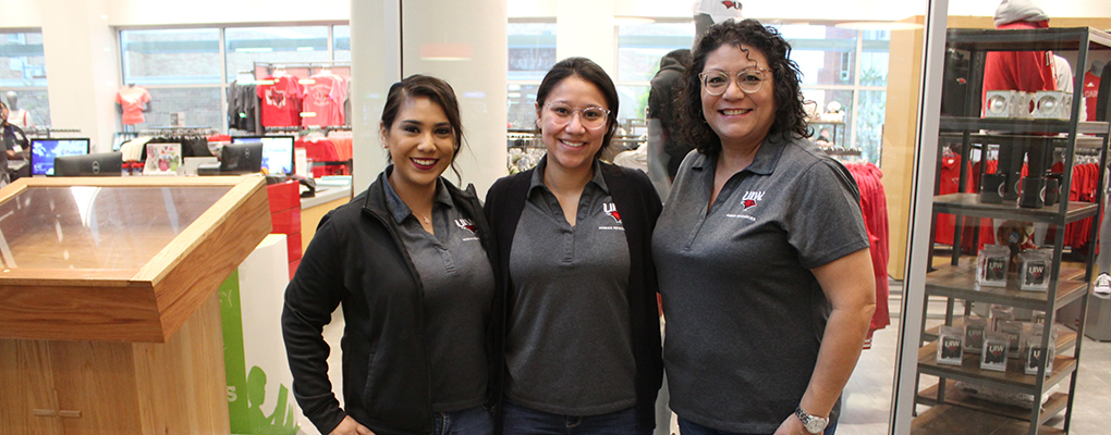 Three UIW employees pose for a photo together