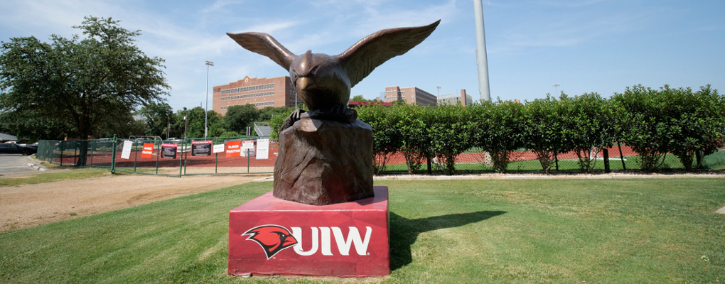 A statue of a cardinal bird