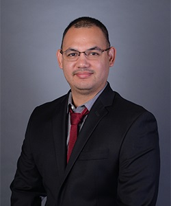 A headshot of Dr. Johnathan Cuevas