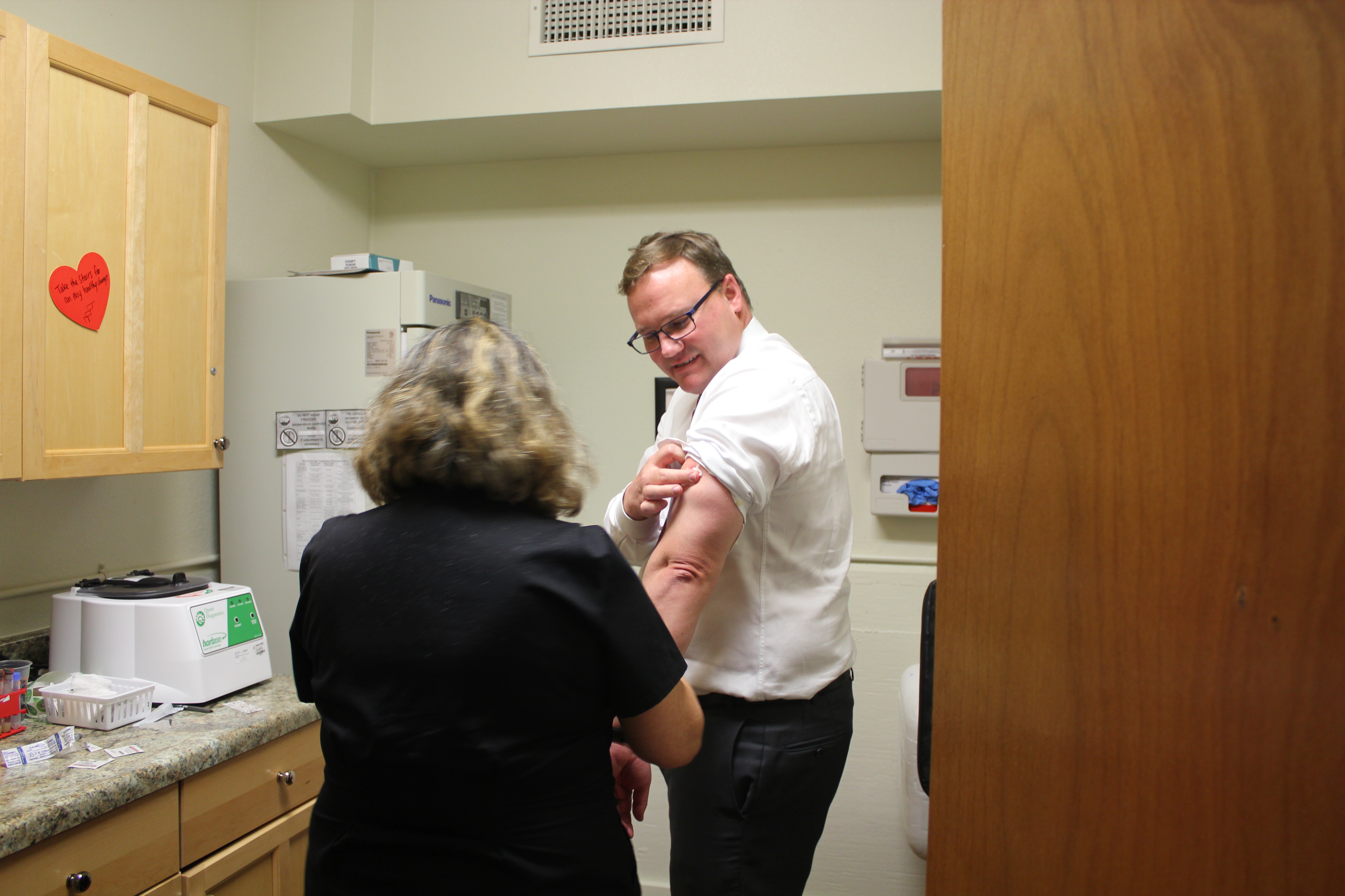 Dr. Evans gets his flu shot at UIW
