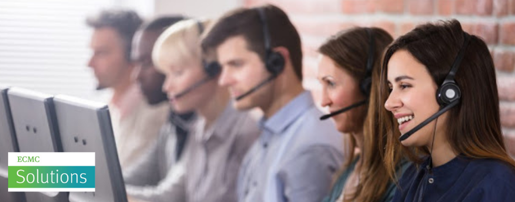 A group of people use computers and wear headsets with the ECMC Solutions logo in the left bottom corner