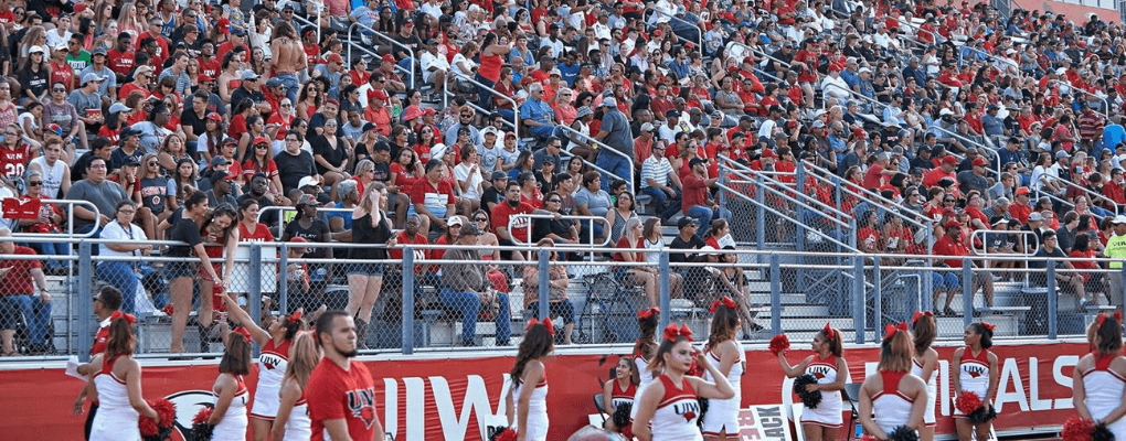 A crowd of fans in a stadium