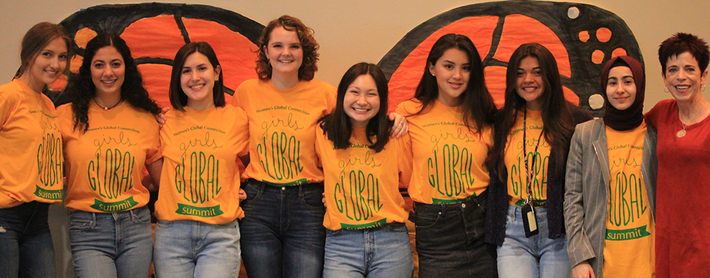 A group of girls pose for a photo