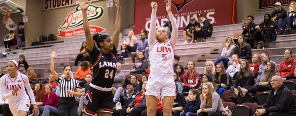 A basketball player aims for the basket