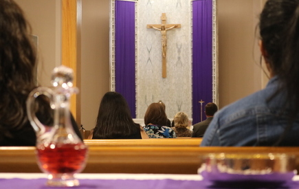 The view from the back of a chapel during Mass