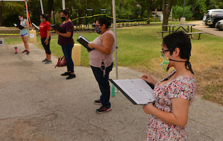 Choral students rehearse outside