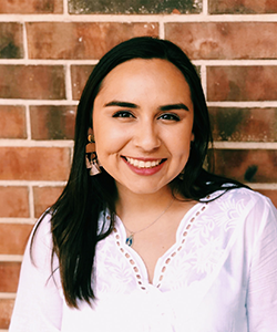 A headshot of Julia King