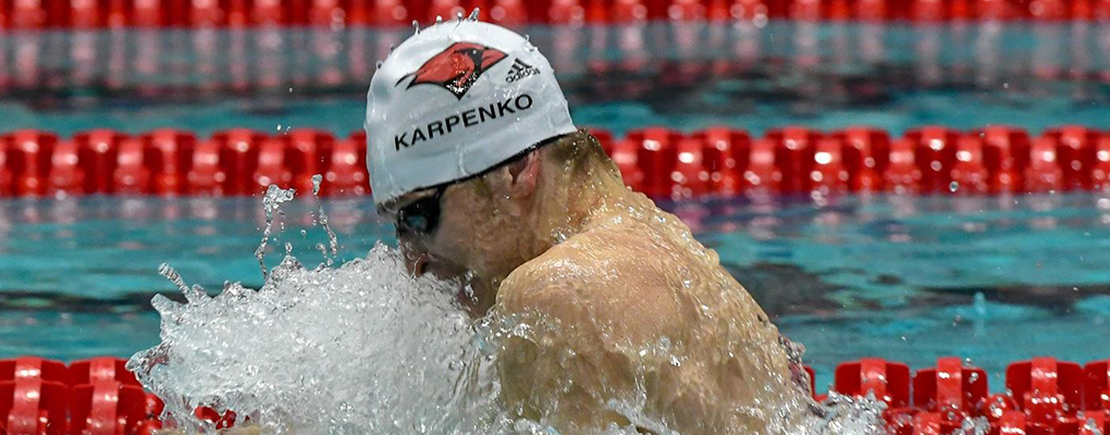 A UIW swimmer competes