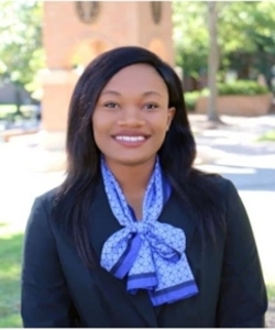 A headshot of Kemi Alabi