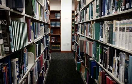 An image of library bookshelves