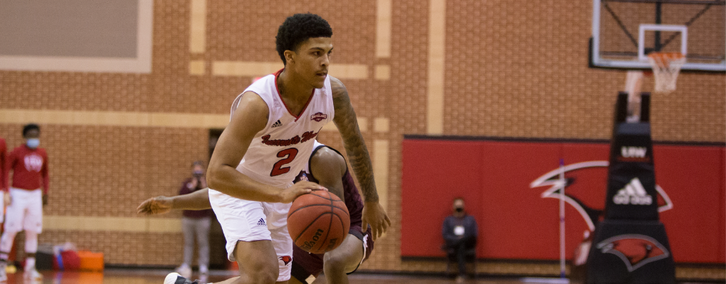 A UIW basketball player on the court