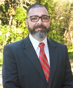 A headshot of Dr. Jorge Medina