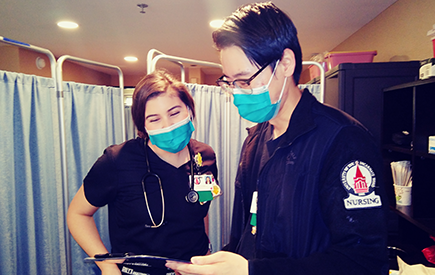 Two nursing students wearing masks