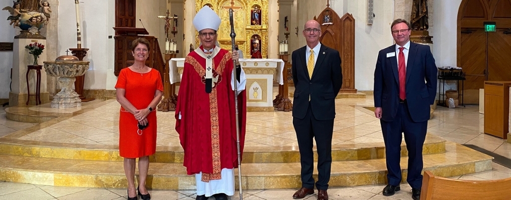 San Antonio Catholic school presidents and Archbishop Gustavo stand for a photo