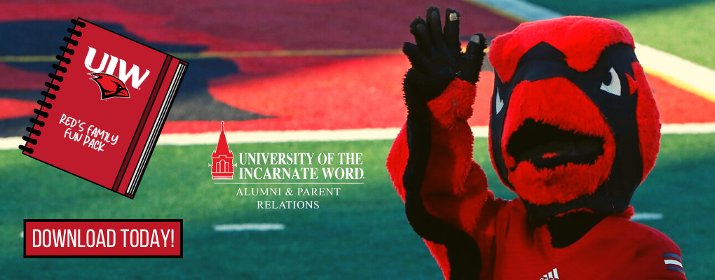 Red the Cardinal, UIW mascot, stands on the football field