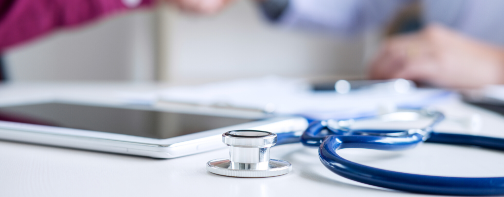 A stethoscope lays out on a table