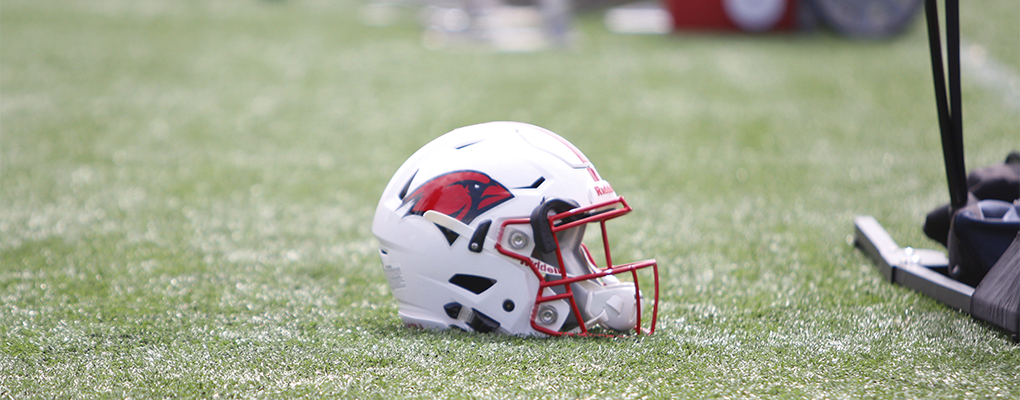 A UIW football helmet on a football field