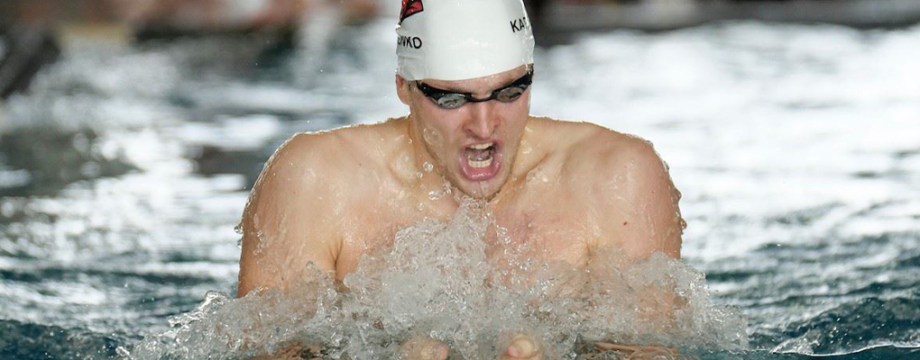 Swimmer swims in pool