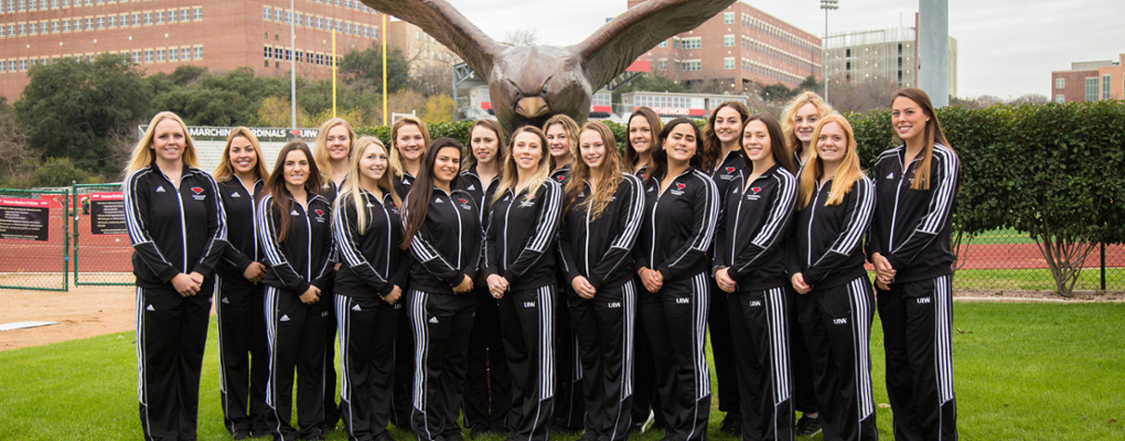 A group photo of the synchronized swimming team