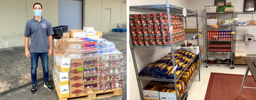 A volunteer stands next to donated food