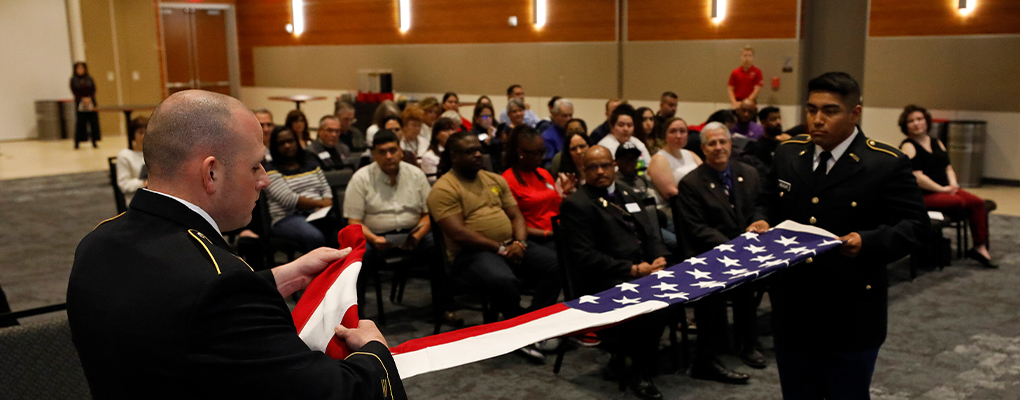 UIW ROTC members fold U.S. flag