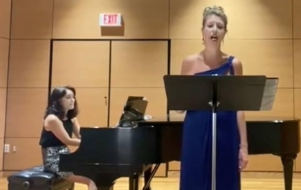 Dr. Orit Eylon sings and Dr. Ara Koh plays the piano