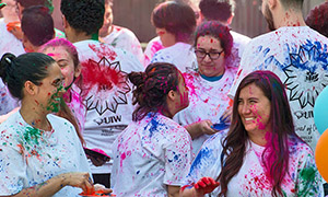 Students taking part in Holi festival celebration