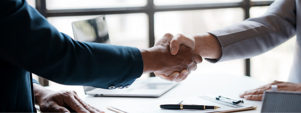 two people shaking hands